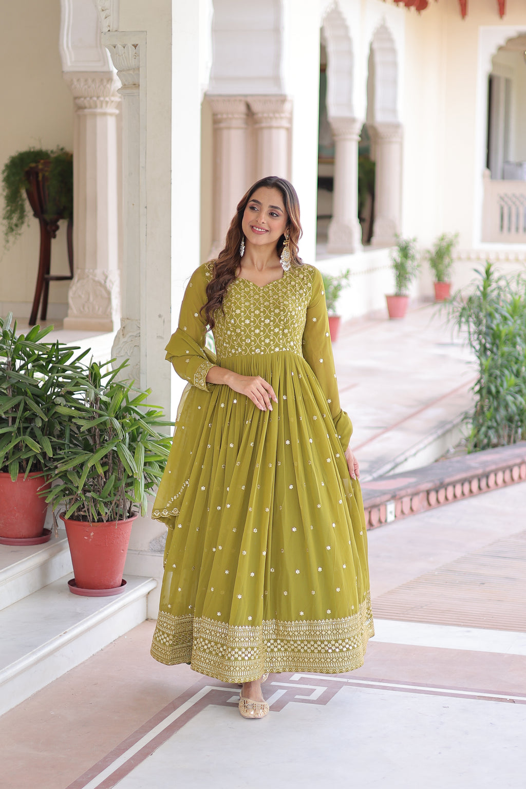 Aarini Green Color Faux Georgette Sequins Zari Embroidered Gown with Dupatta