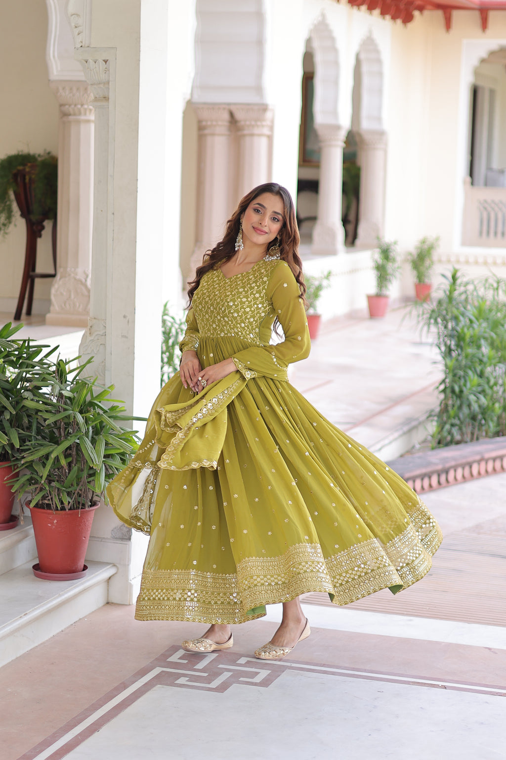 Aarini Green Color Faux Georgette Sequins Zari Embroidered Gown with Dupatta