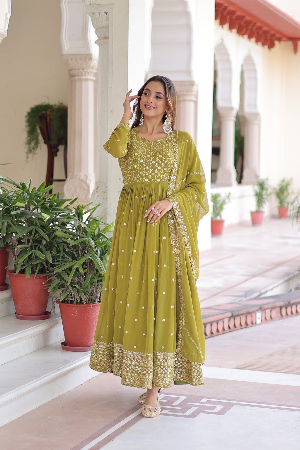 Aarini Green Color Faux Georgette Sequins Zari Embroidered Gown with Dupatta