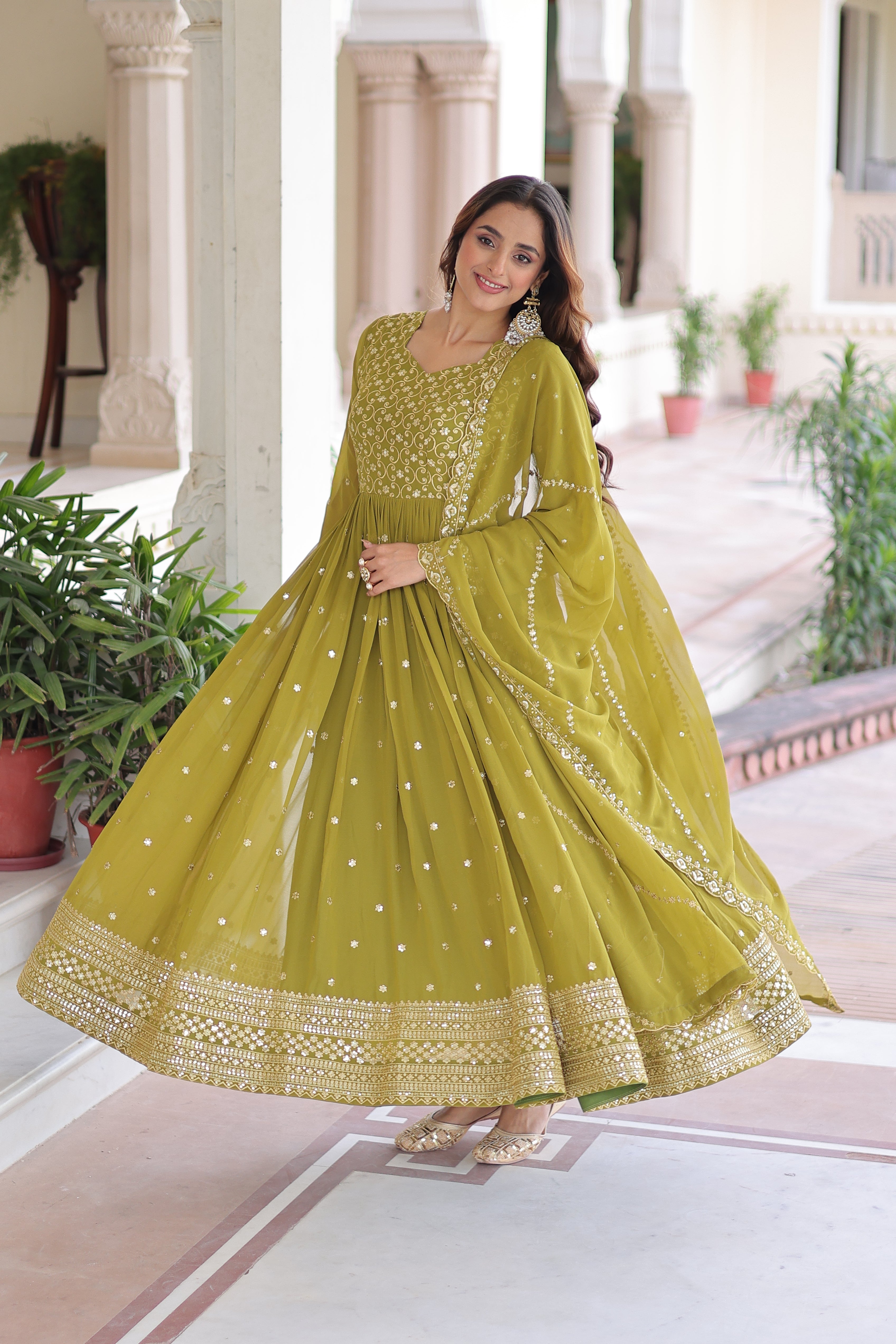 Aarini Green Color Faux Georgette Sequins Zari Embroidered Gown with Dupatta