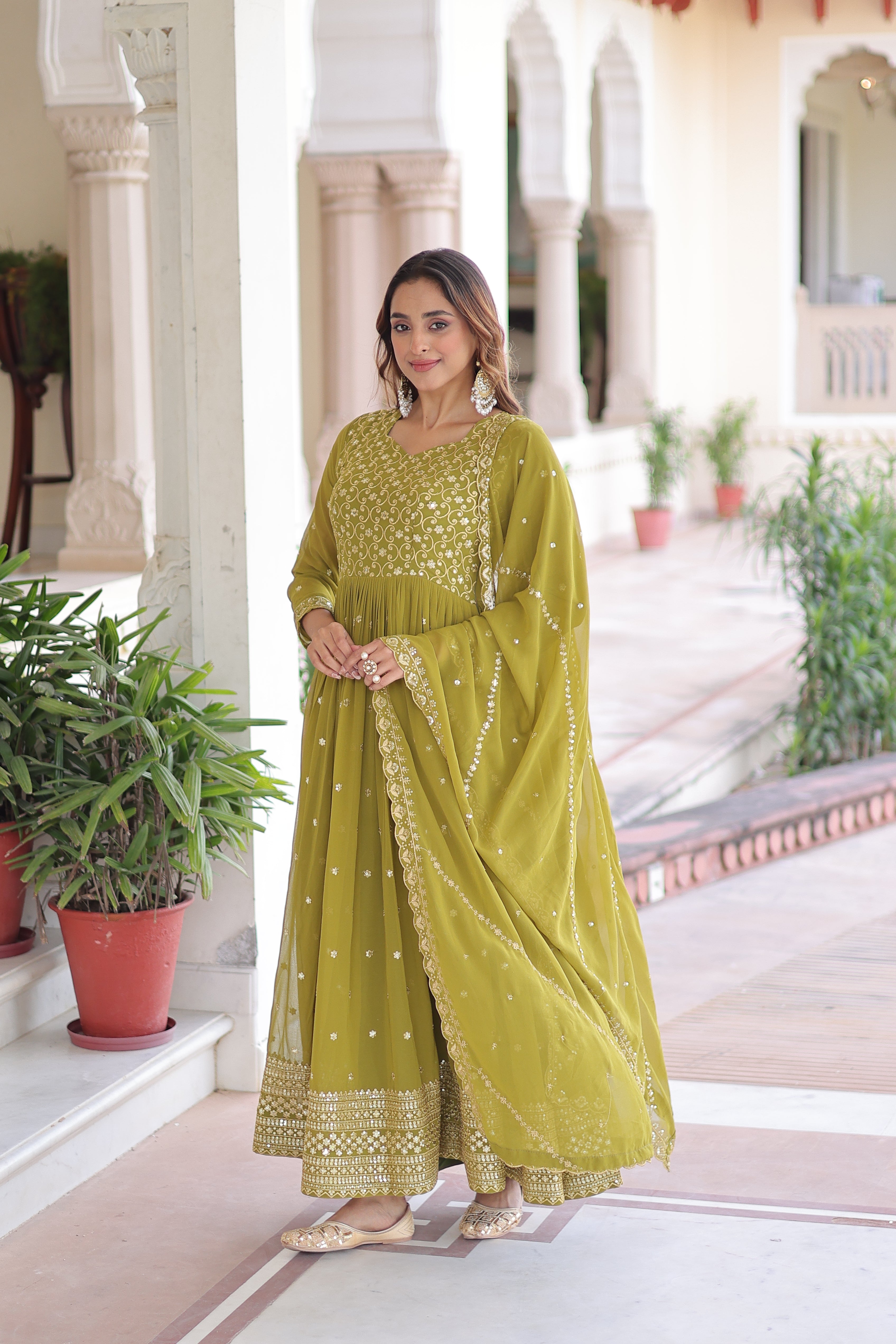 Aarini Green Color Faux Georgette Sequins Zari Embroidered Gown with Dupatta