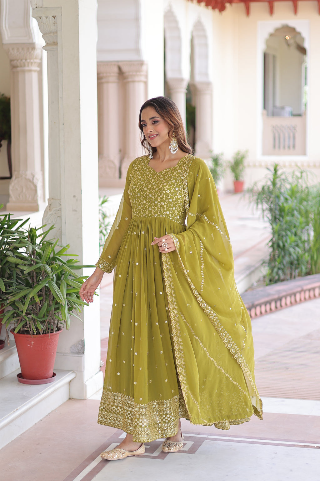 Aarini Green Color Faux Georgette Sequins Zari Embroidered Gown with Dupatta