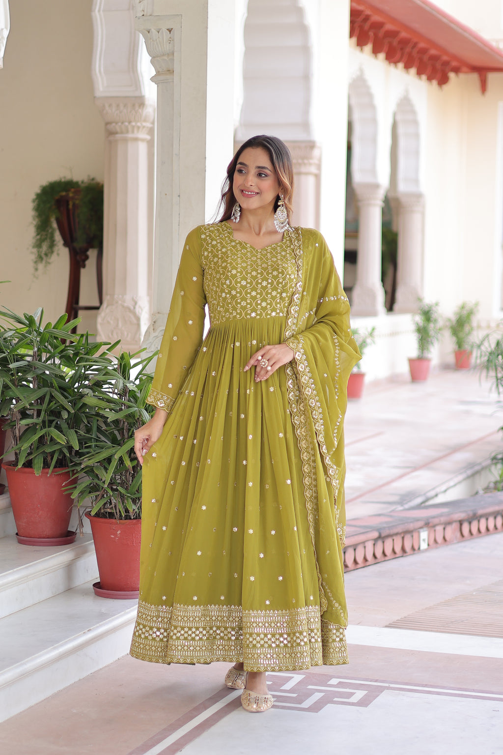 Aarini Green Color Faux Georgette Sequins Zari Embroidered Gown with Dupatta