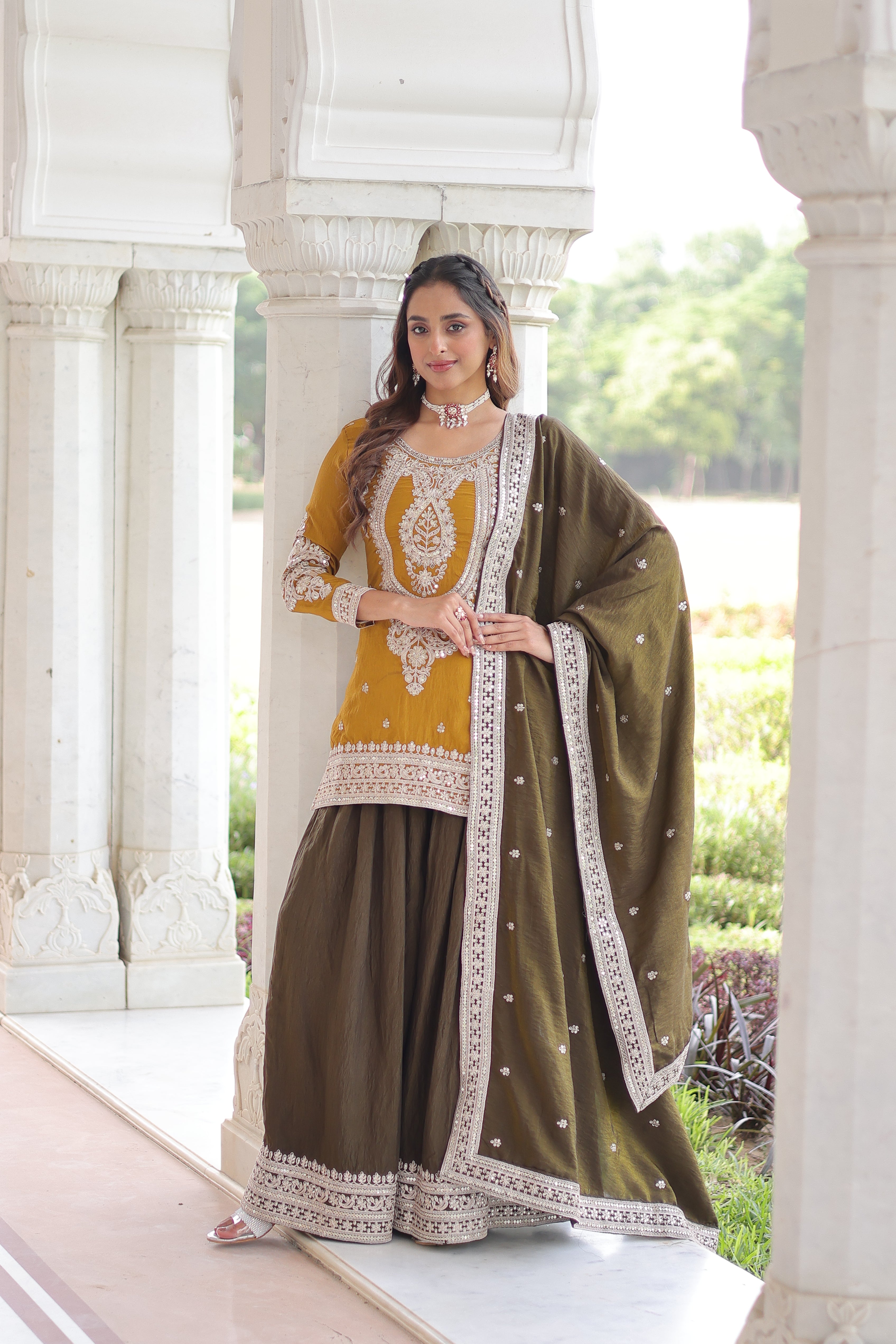 Vyara Yellow Color Silk With
Sequins Codding Embroidered Kurti Sharara Set