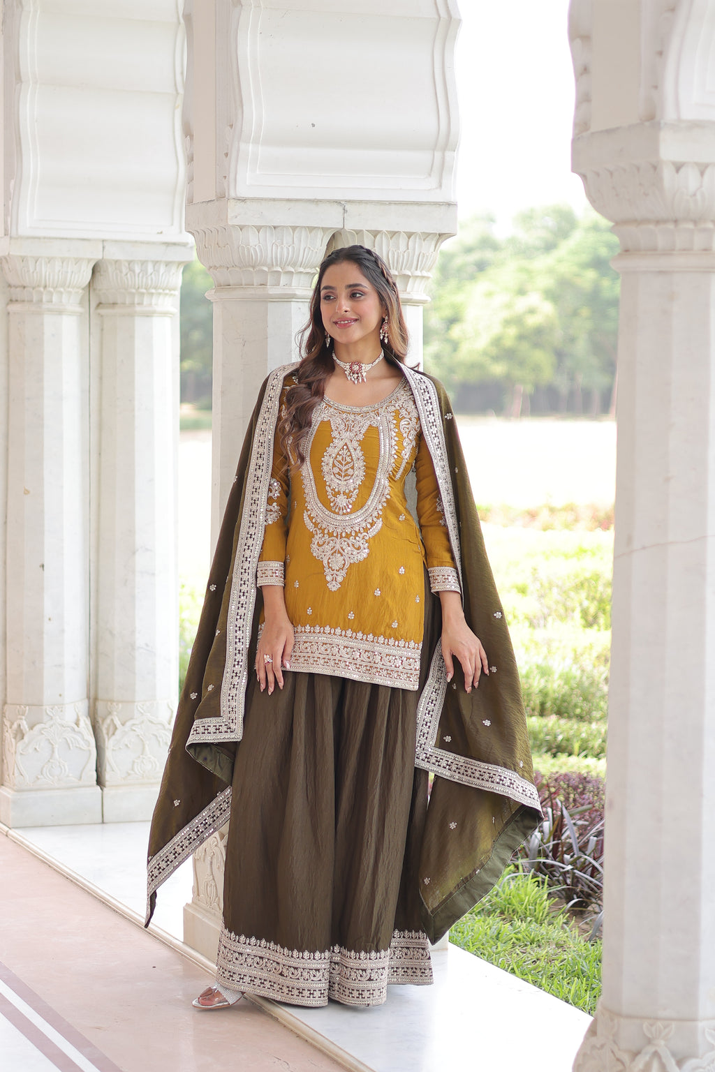 Vyara Yellow Color Silk With
Sequins Codding Embroidered Kurti Sharara Set