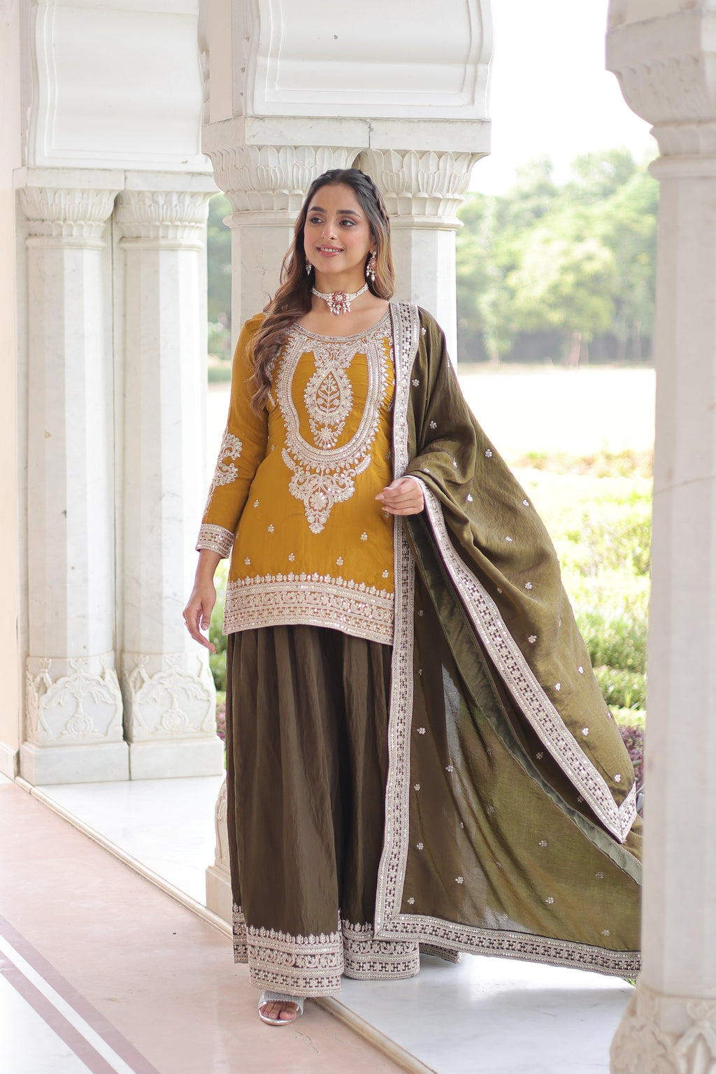 Vyara Yellow Color Silk With
Sequins Codding Embroidered Kurti Sharara Set