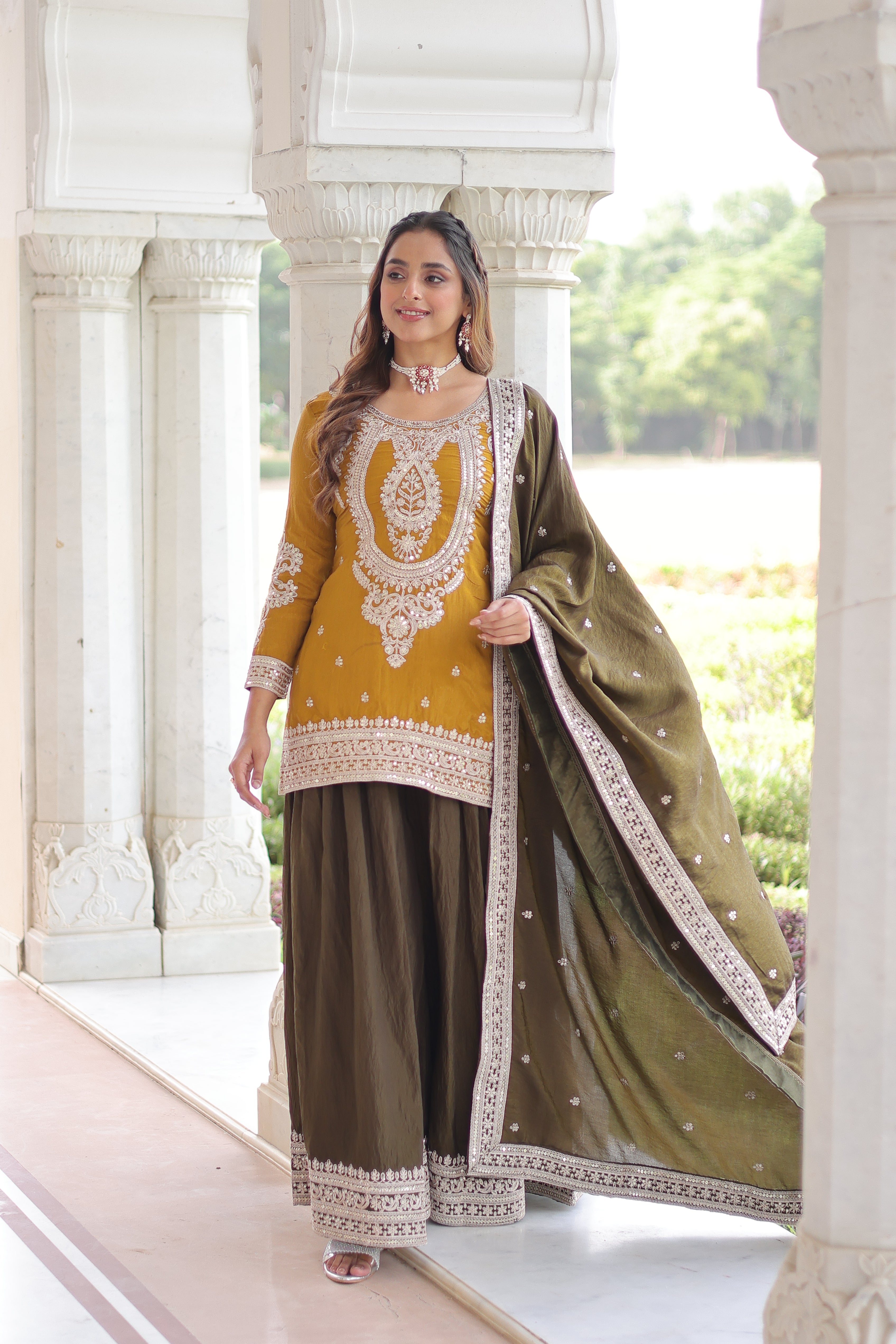 Vyara Yellow Color Silk With
Sequins Codding Embroidered Kurti Sharara Set