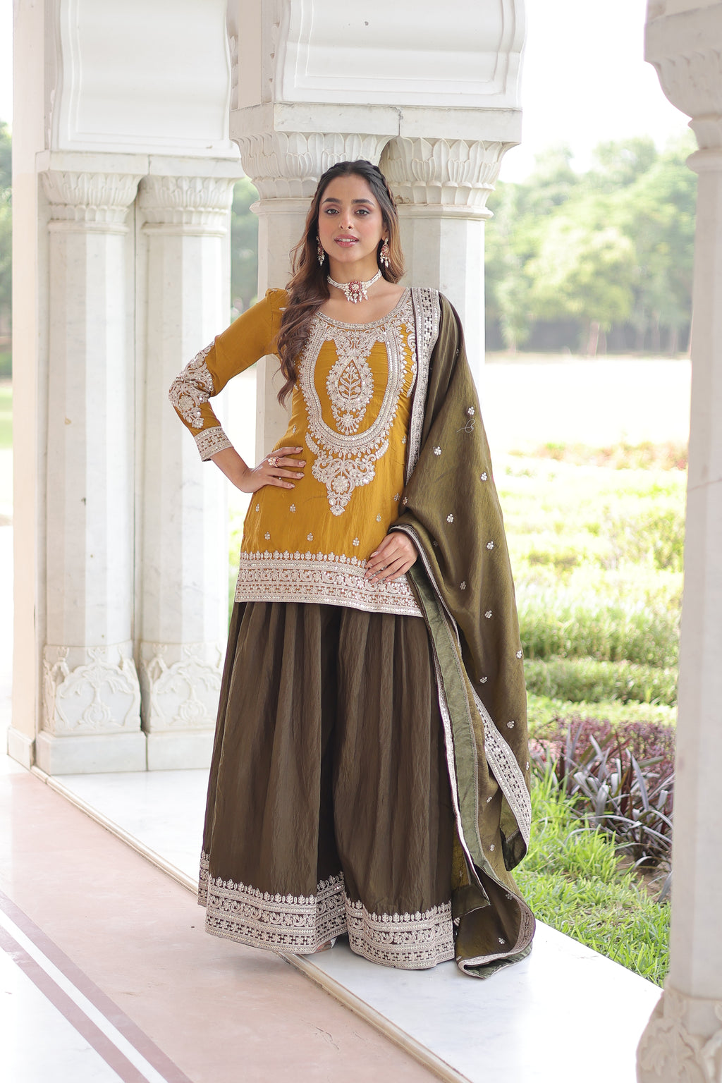 Vyara Yellow Color Silk With
Sequins Codding Embroidered Kurti Sharara Set