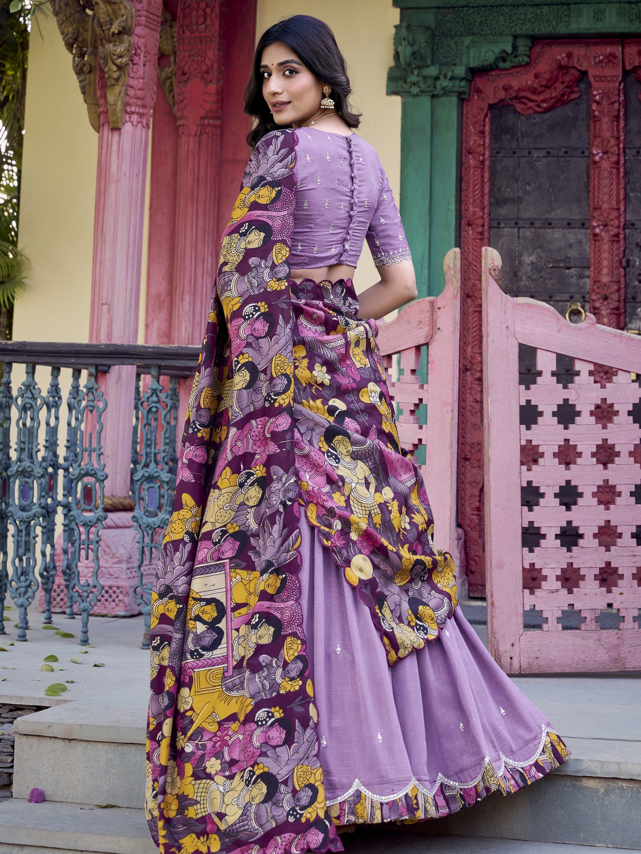 Elegant lavender Vichitra silk lehenga choli set with heavy sequins and thread embroidery, 4-meter flair, Kalamkari printed border and dupatta with scallop detailing – perfect for weddings and festive occasions