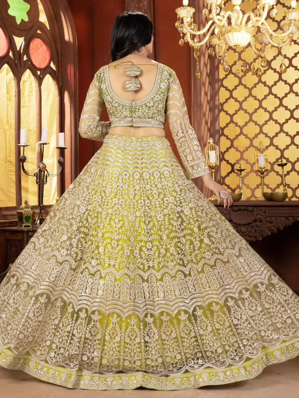 Lime green net embroidered sequins work lehenga choli with dupatta