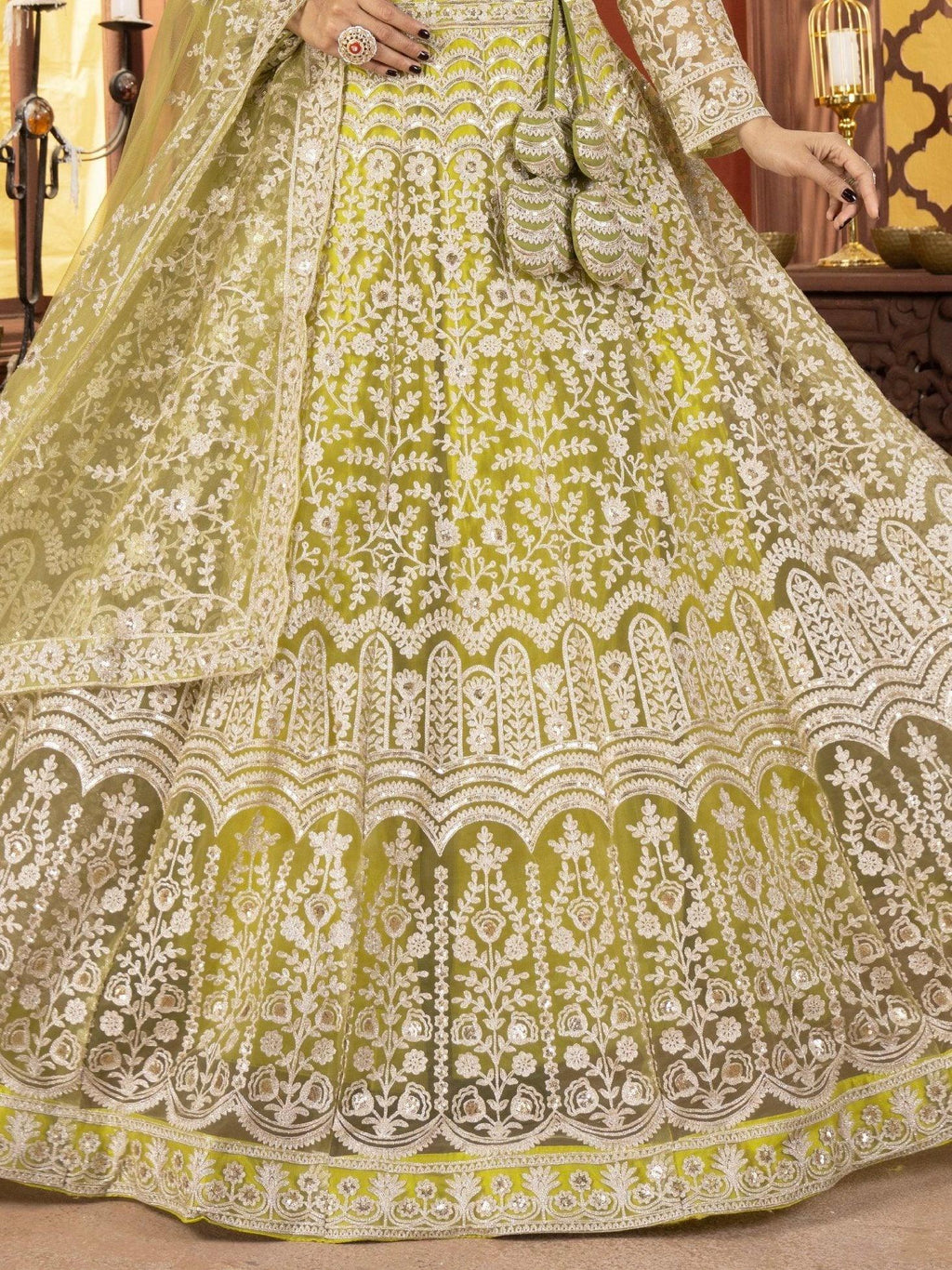 Lime green net embroidered sequins work lehenga choli with dupatta