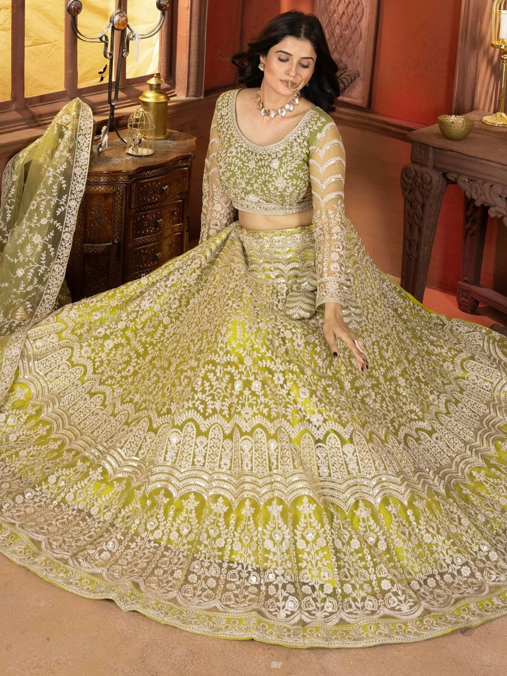 Lime green net embroidered sequins work lehenga choli with dupatta