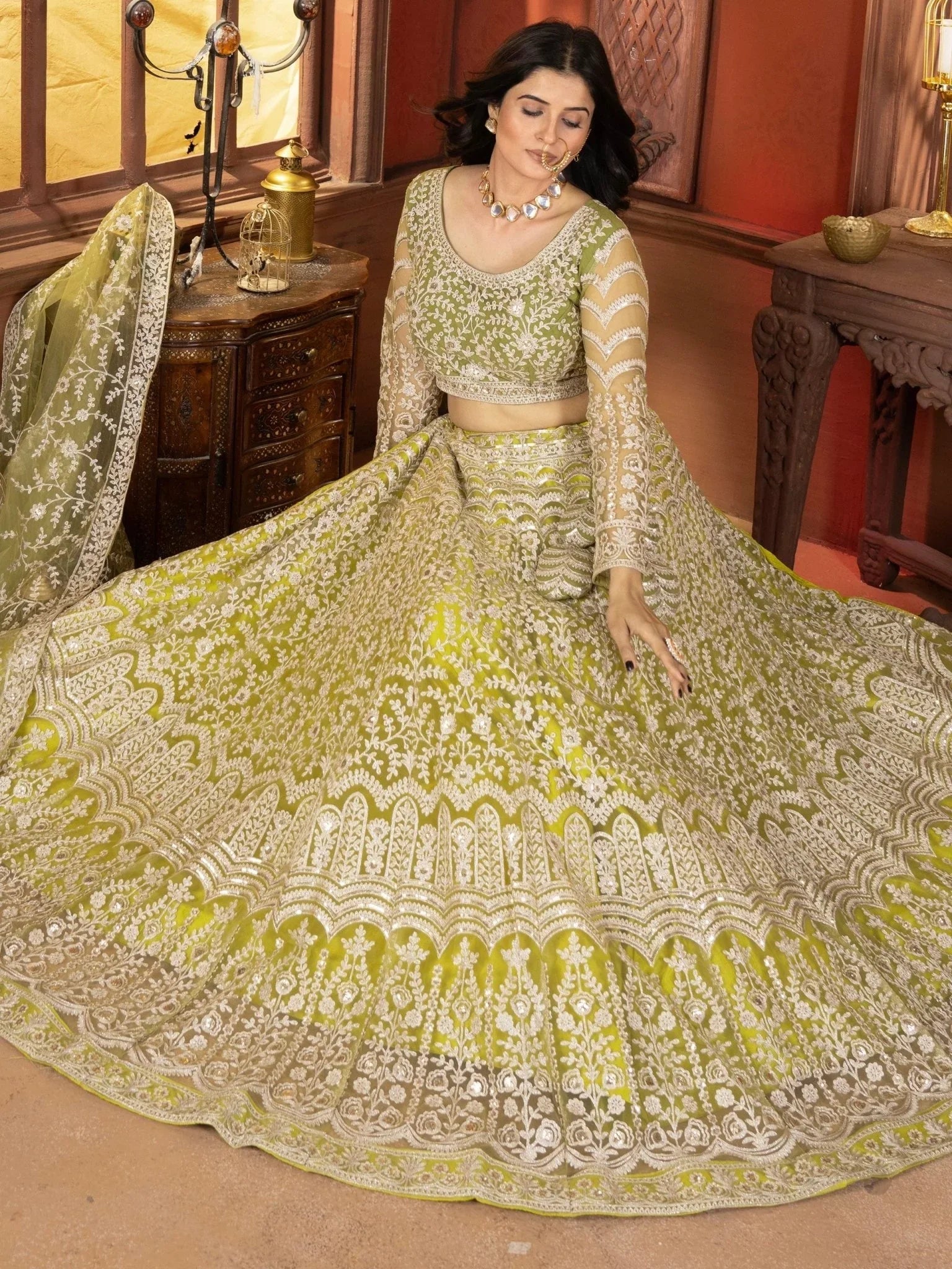 Lime green net embroidered sequins work lehenga choli with dupatta