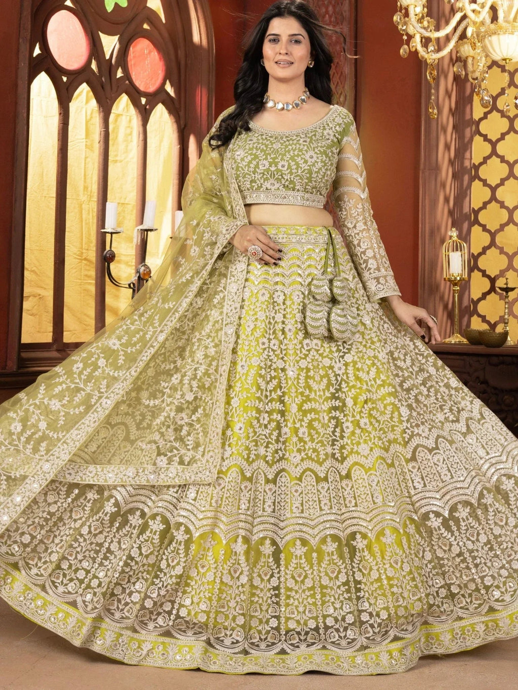 Lime green net embroidered sequins work lehenga choli with dupatta