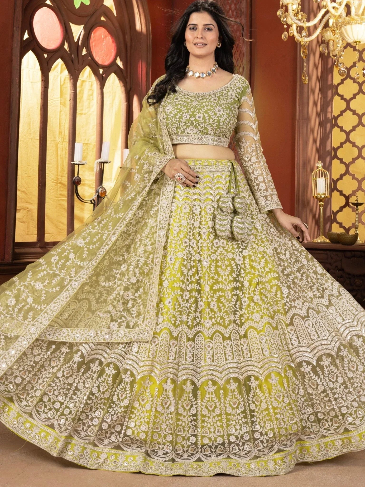 Lime green net embroidered sequins work lehenga choli with dupatta