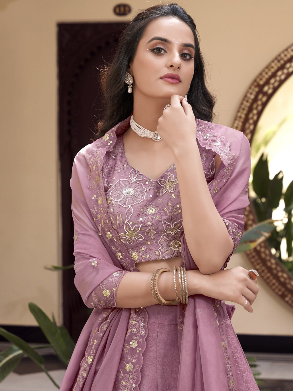 Mauve pink organza lehenga choli with pearl coding and sequins embroidery