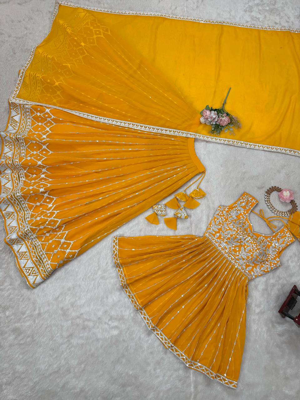 Mustard yellow georgette sequin embroidered lehenga with top