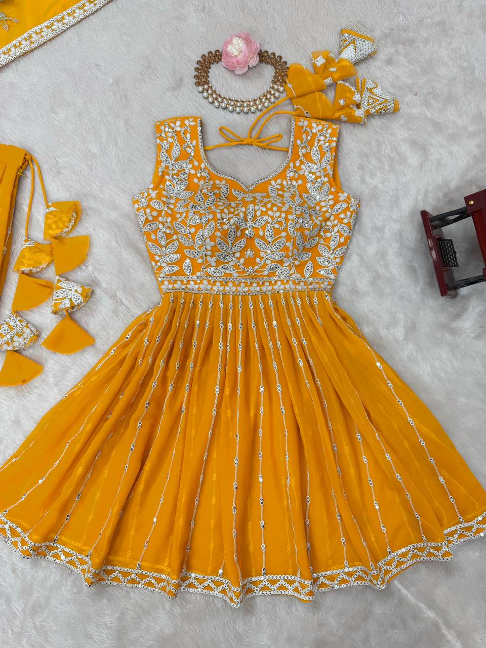 Mustard yellow georgette sequin embroidered lehenga with top