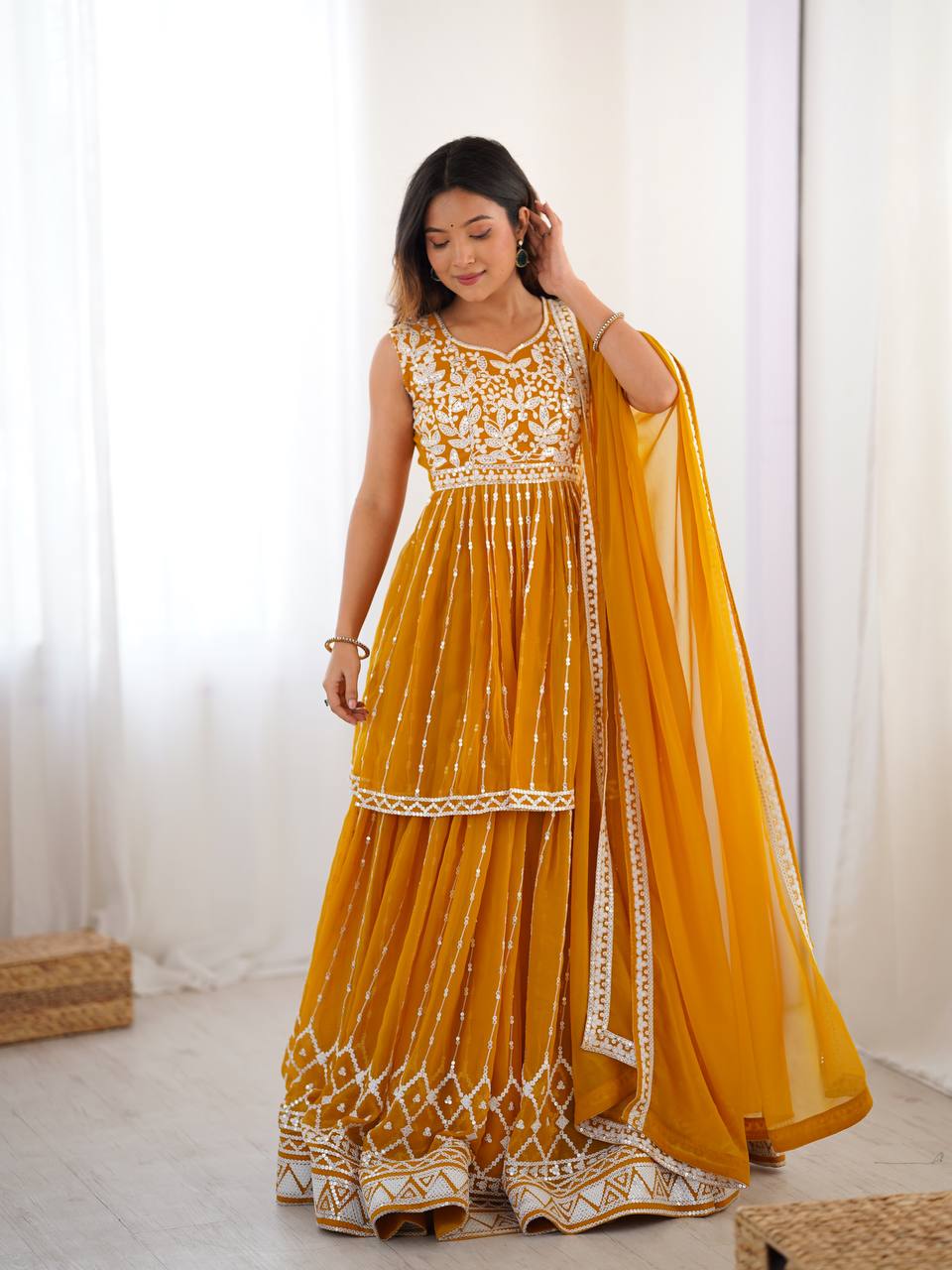 Mustard yellow georgette sequin embroidered lehenga with top