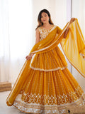 Mustard yellow georgette sequin embroidered lehenga with top