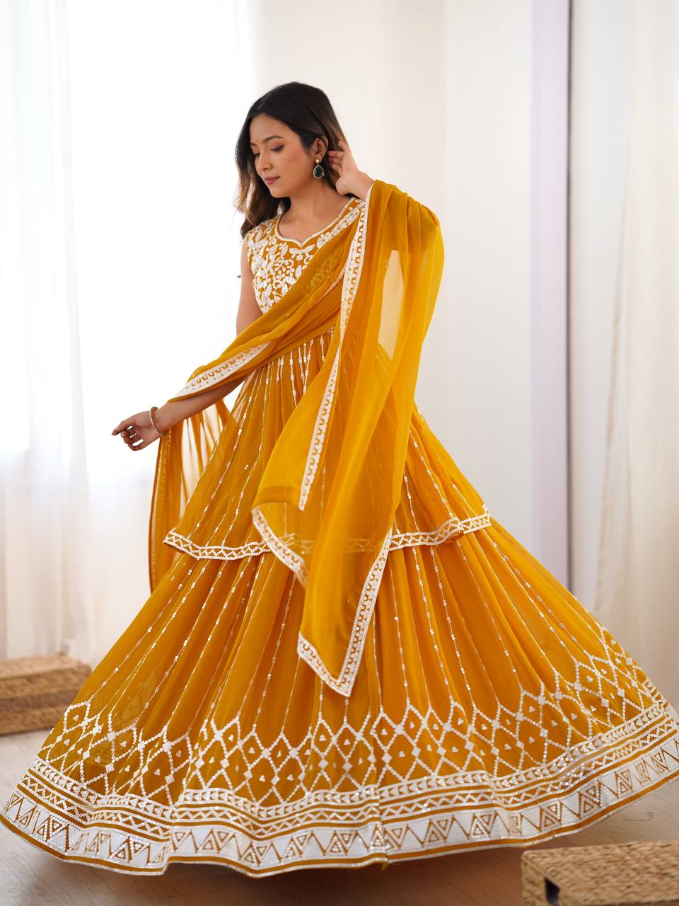 Mustard yellow georgette sequin embroidered lehenga with top