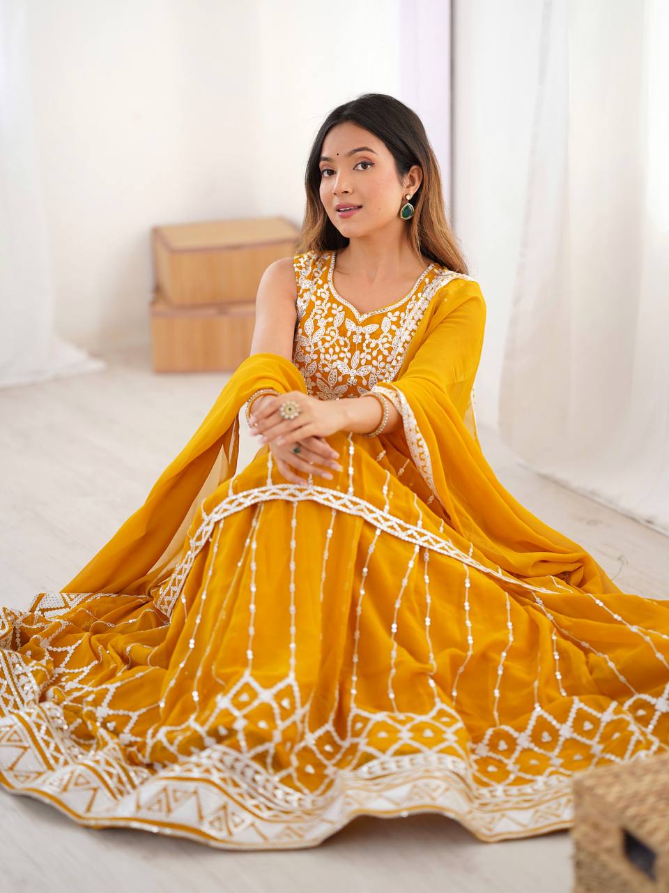 Mustard yellow georgette sequin embroidered lehenga with top