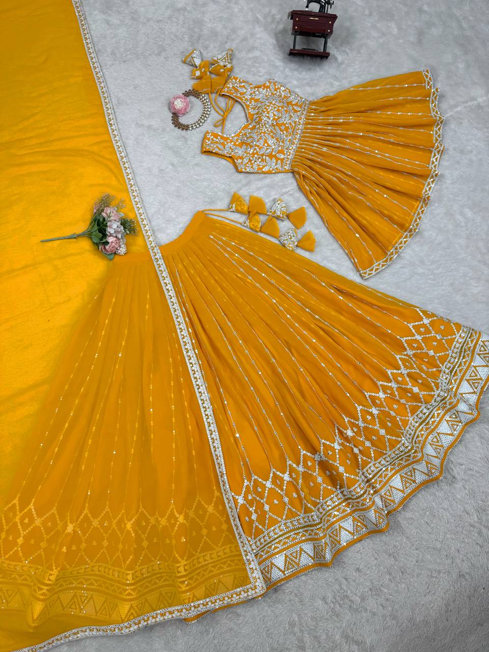 Mustard yellow georgette sequin embroidered lehenga with top