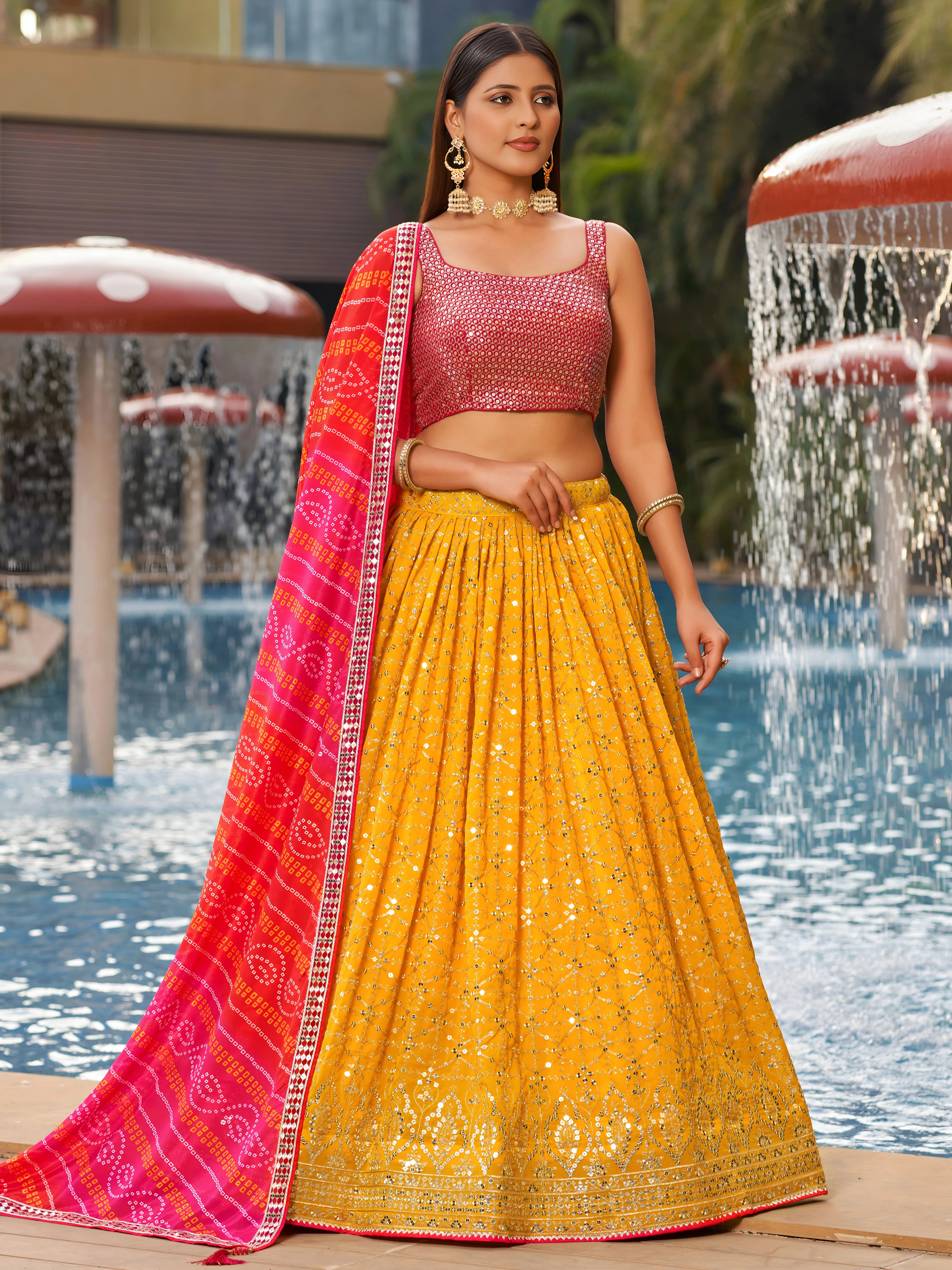 Navya Sunlit Yellow Color Embroidered Lehenga Choli with Bandhani Dupatta