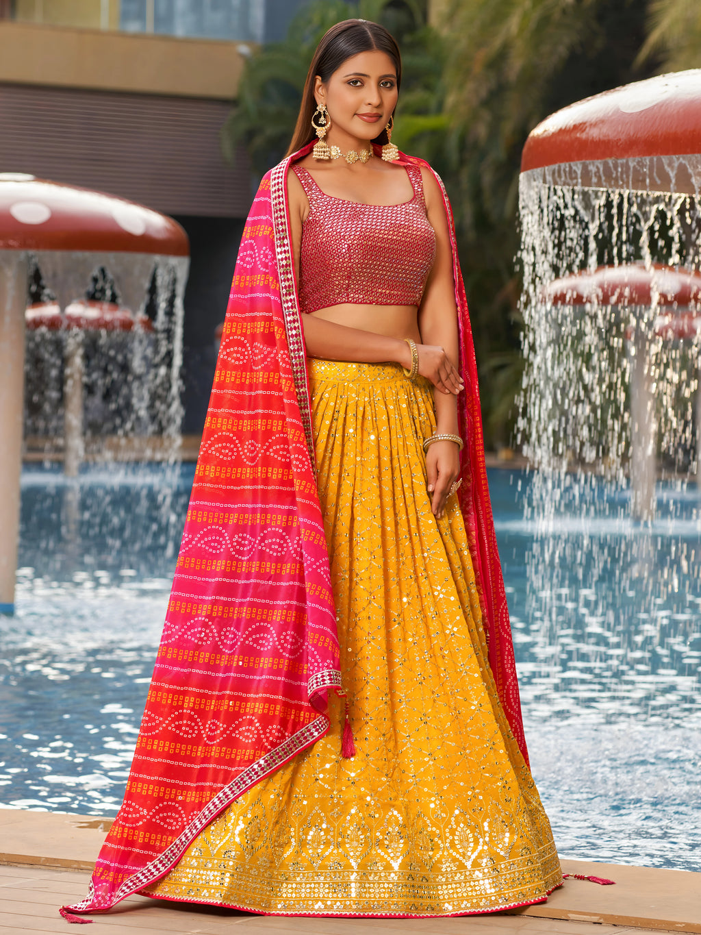 Navya Sunlit Yellow Color Embroidered Lehenga Choli with Bandhani Dupatta