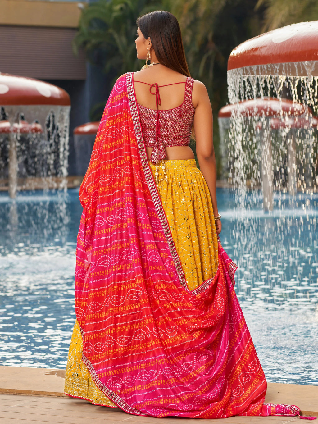 Navya Sunlit Yellow Color Embroidered Lehenga Choli with Bandhani Dupatta