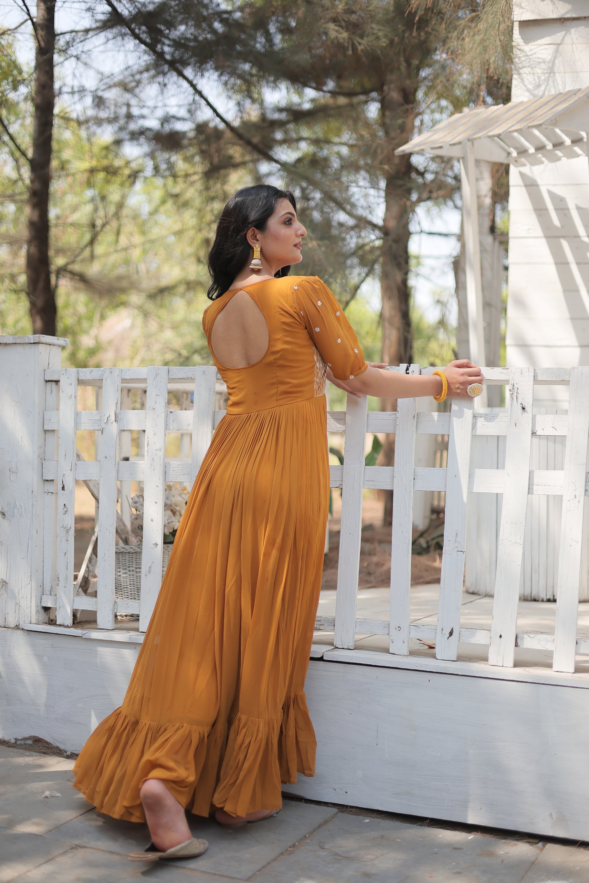Nitara mustard yellow georgette embroidered Anarkali gown