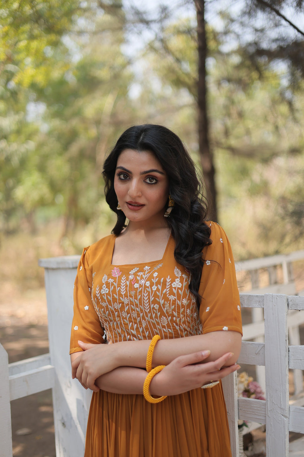 Nitara mustard yellow georgette embroidered Anarkali gown