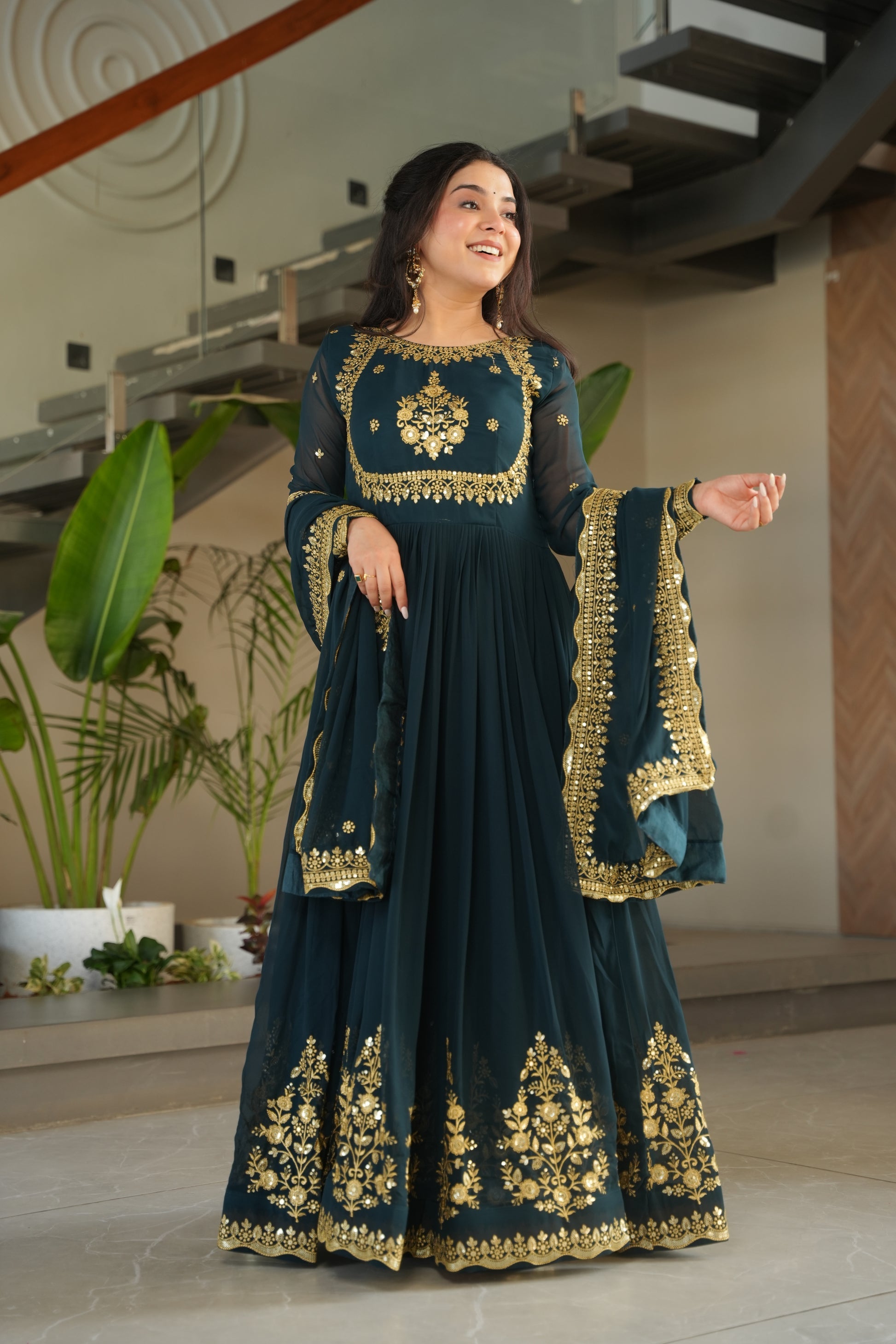 Rama green embroidered Anarkali gown set for women with dupatta, elegant floor-length ethnic outfit featuring detailed zari and sequin embroidery, designer party wear gown with flared silhouette and full sleeves, perfect for wedding functions, festive wear, engagement, and traditional Indian celebrations in 2025 ethnic fashion trends.