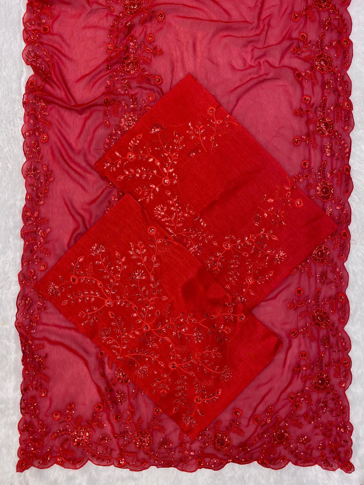 Opulent Red Embroidered Georgette Saree