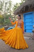 Parnika yellow rayon embroidered Navratri lehenga choli