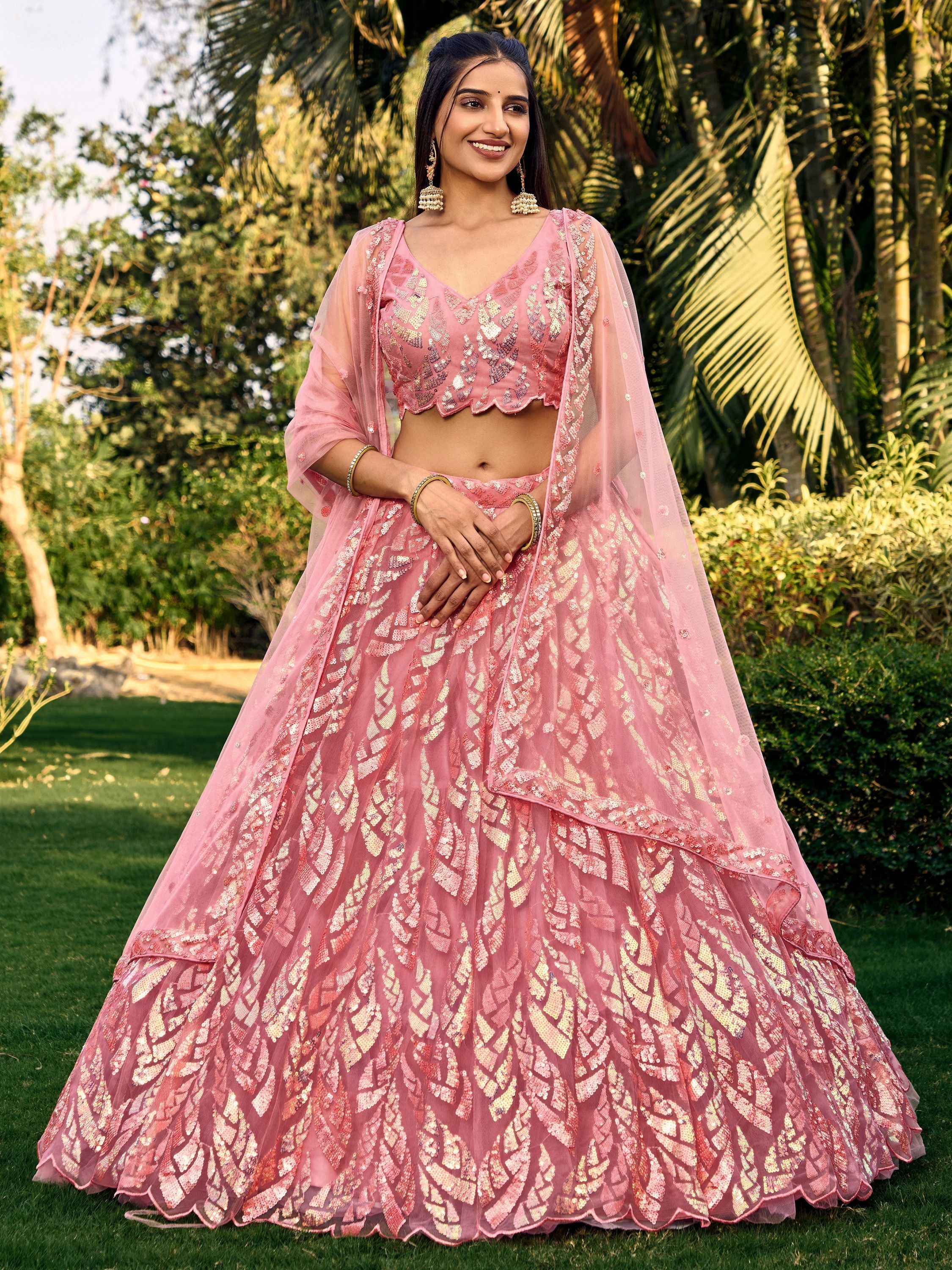 Pink soft net lehenga choli with heavy multi sequins embroidery and lace border dupatta perfect for weddings receptions and glam parties