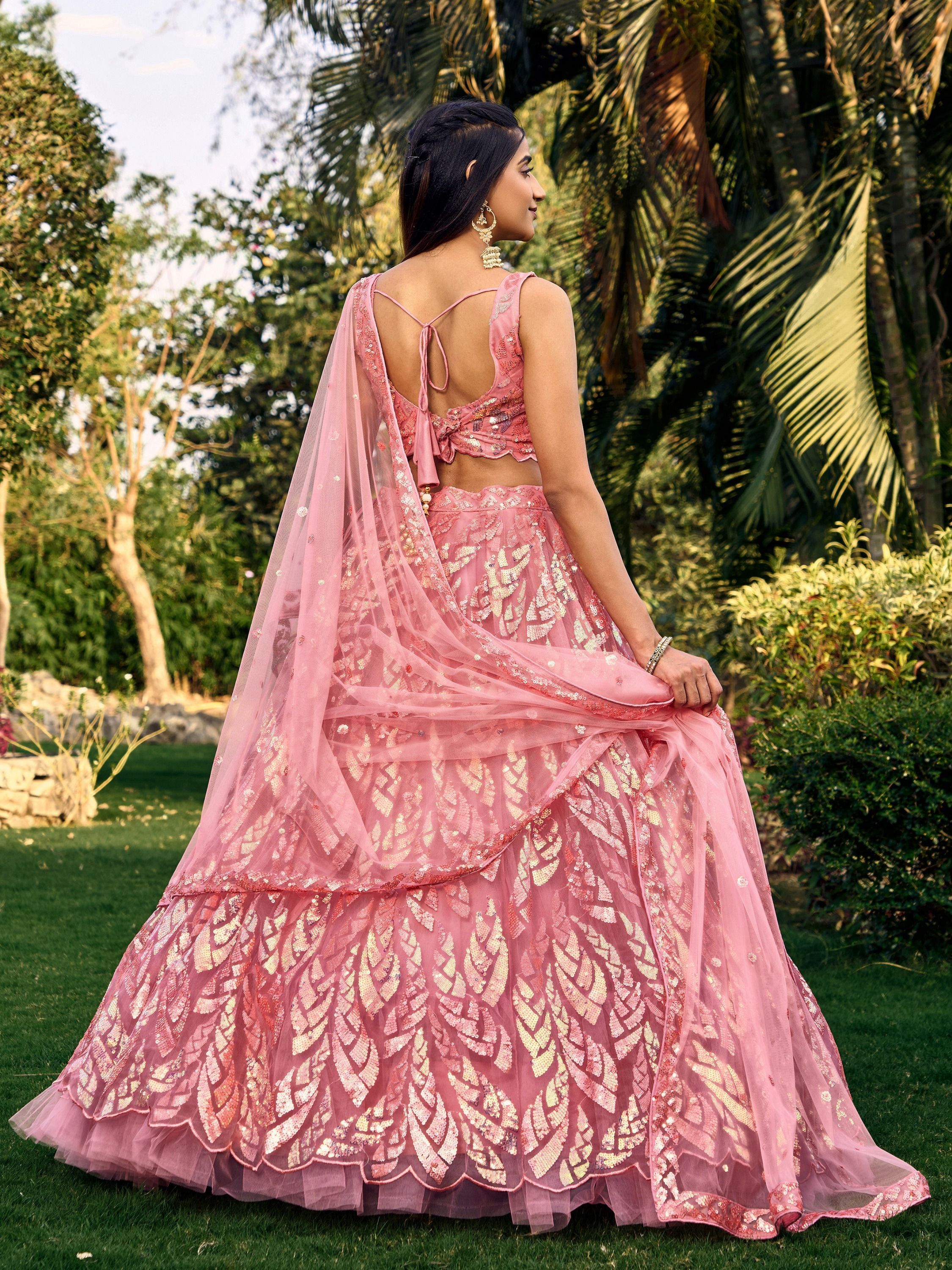 Pink soft net lehenga choli with heavy multi sequins embroidery and lace border dupatta perfect for weddings receptions and glam parties