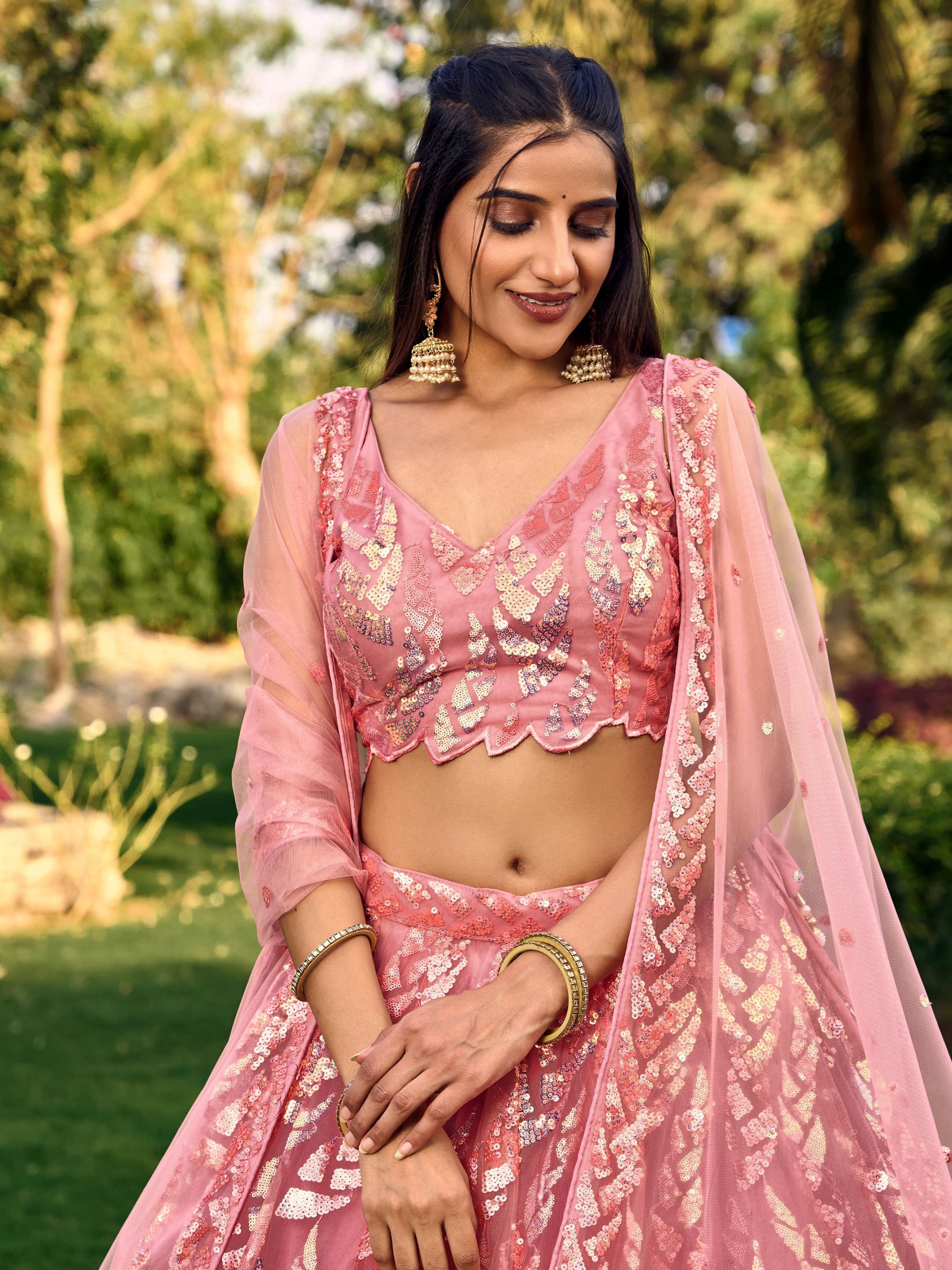 Pink soft net lehenga choli with heavy multi sequins embroidery and lace border dupatta perfect for weddings receptions and glam parties
