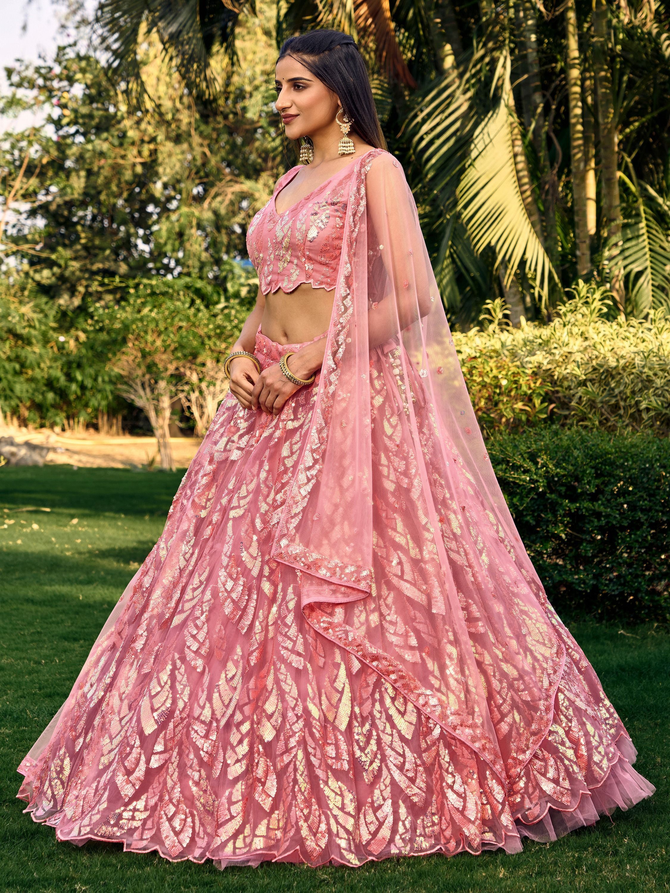 Pink soft net lehenga choli with heavy multi sequins embroidery and lace border dupatta perfect for weddings receptions and glam parties