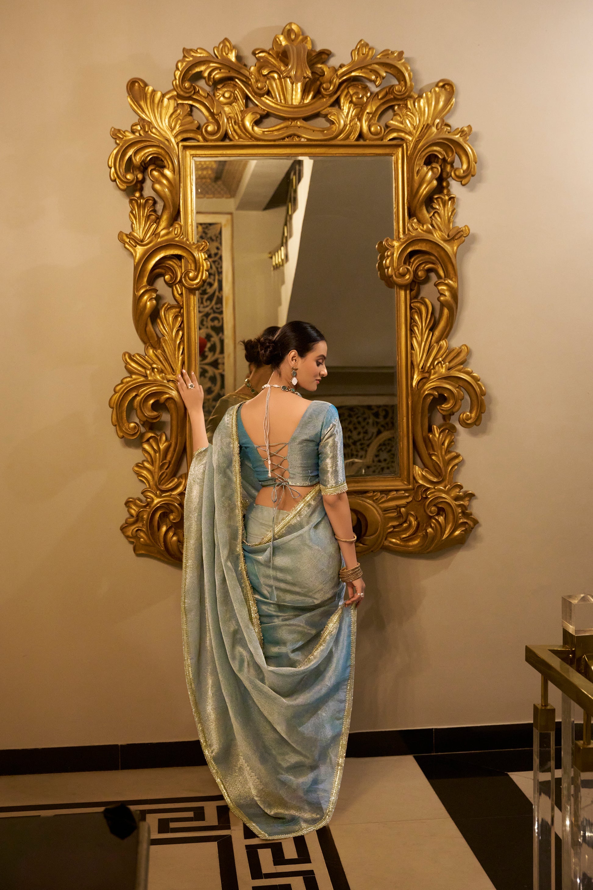 Poorvi Sky Blue Tissue Shimmer Zari Weaving Saree