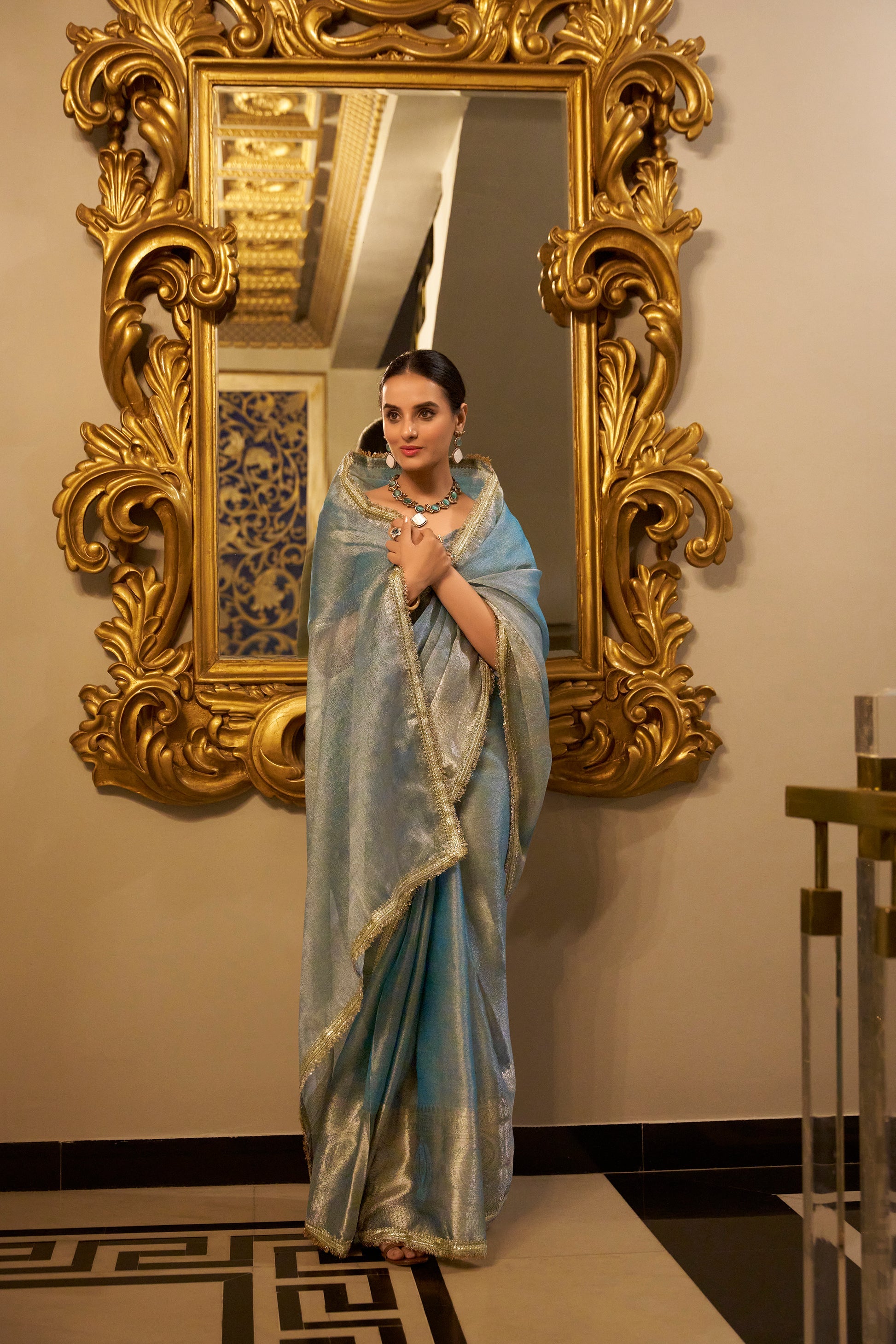 Poorvi Sky Blue Tissue Shimmer Zari Weaving Saree