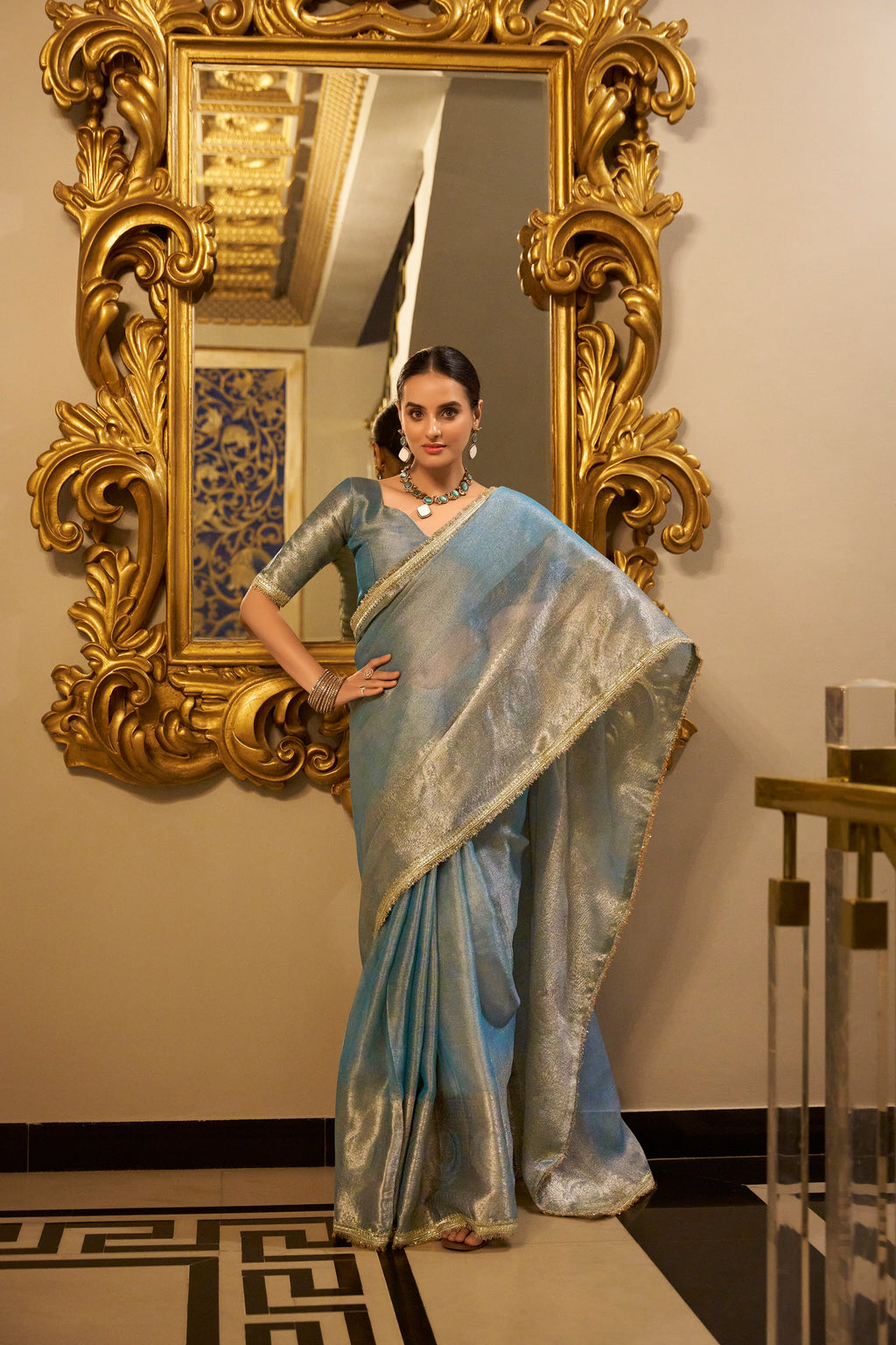 Poorvi Sky Blue Tissue Shimmer Zari Weaving Saree