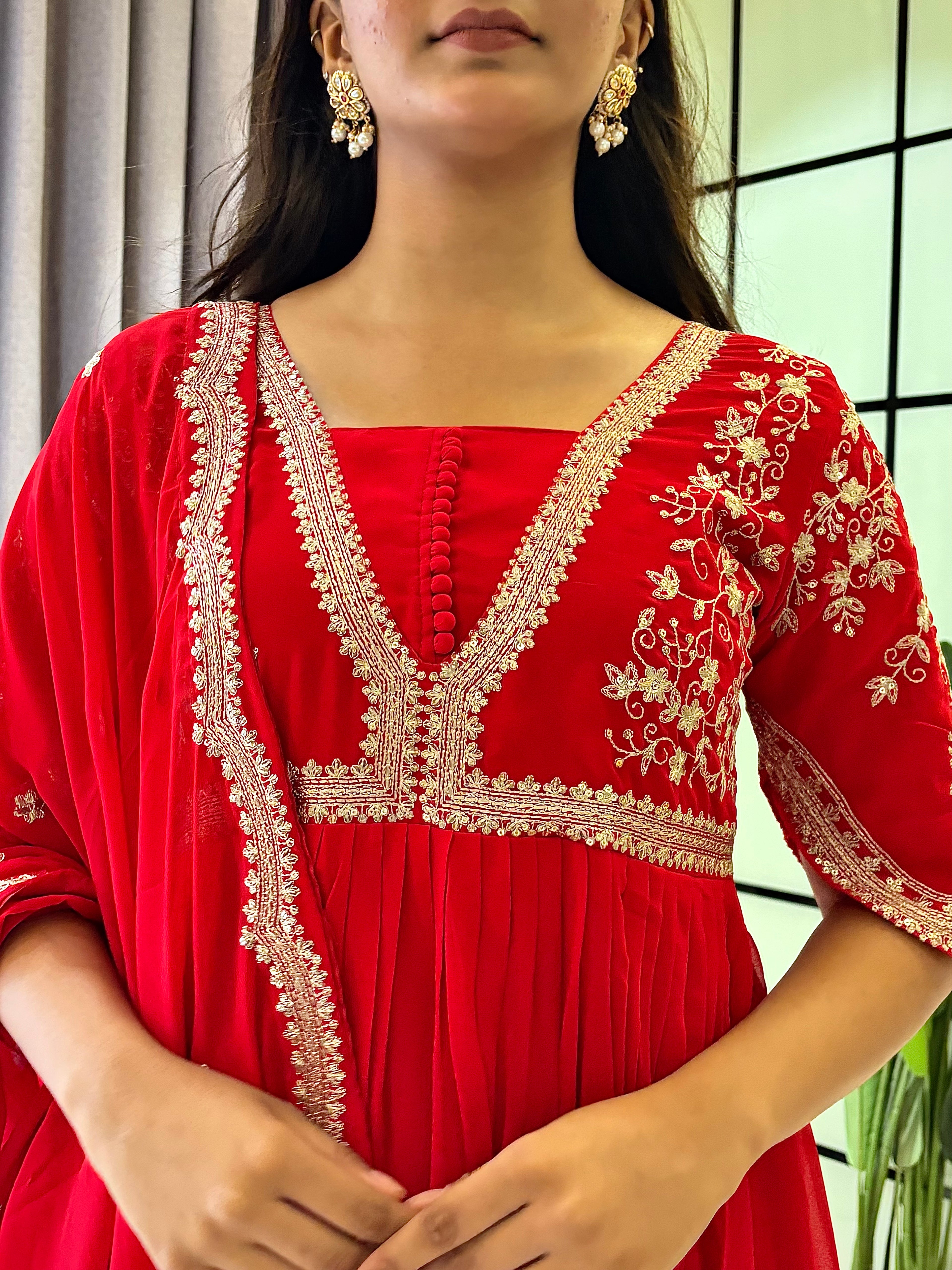 Royal Ruby Red Embroidered Anarkali Gown with Elegant Gold Lace Border and Floral Sleeve Detailing