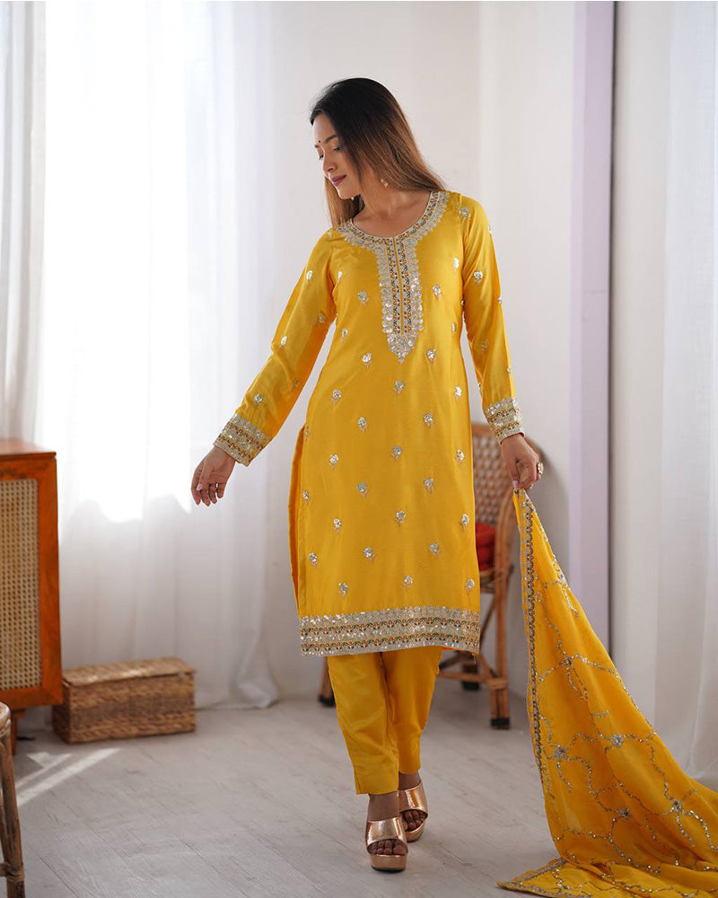 Raktima yellow Chinon silk kurti set featuring thread and sequin embroidery, paired with matching Chinon silk pants and an embroidered dupatta – perfect for weddings, festivals, and modern ethnic wear for women
