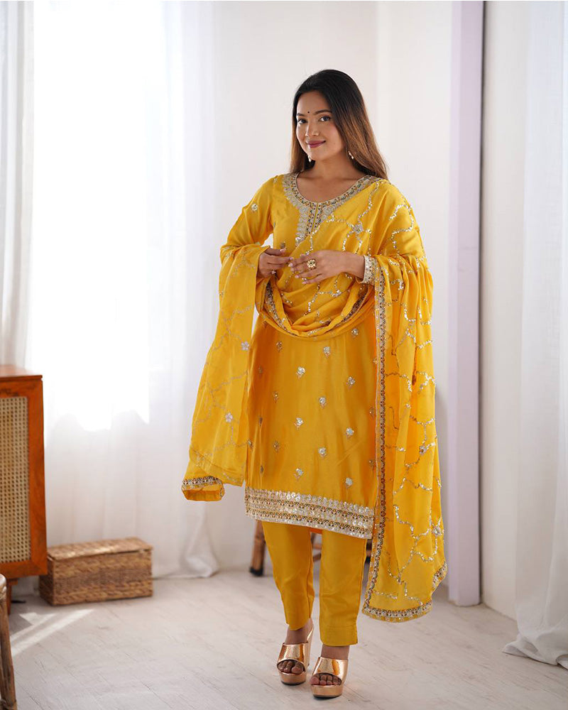 Raktima yellow Chinon silk kurti set featuring thread and sequin embroidery, paired with matching Chinon silk pants and an embroidered dupatta – perfect for weddings, festivals, and modern ethnic wear for women