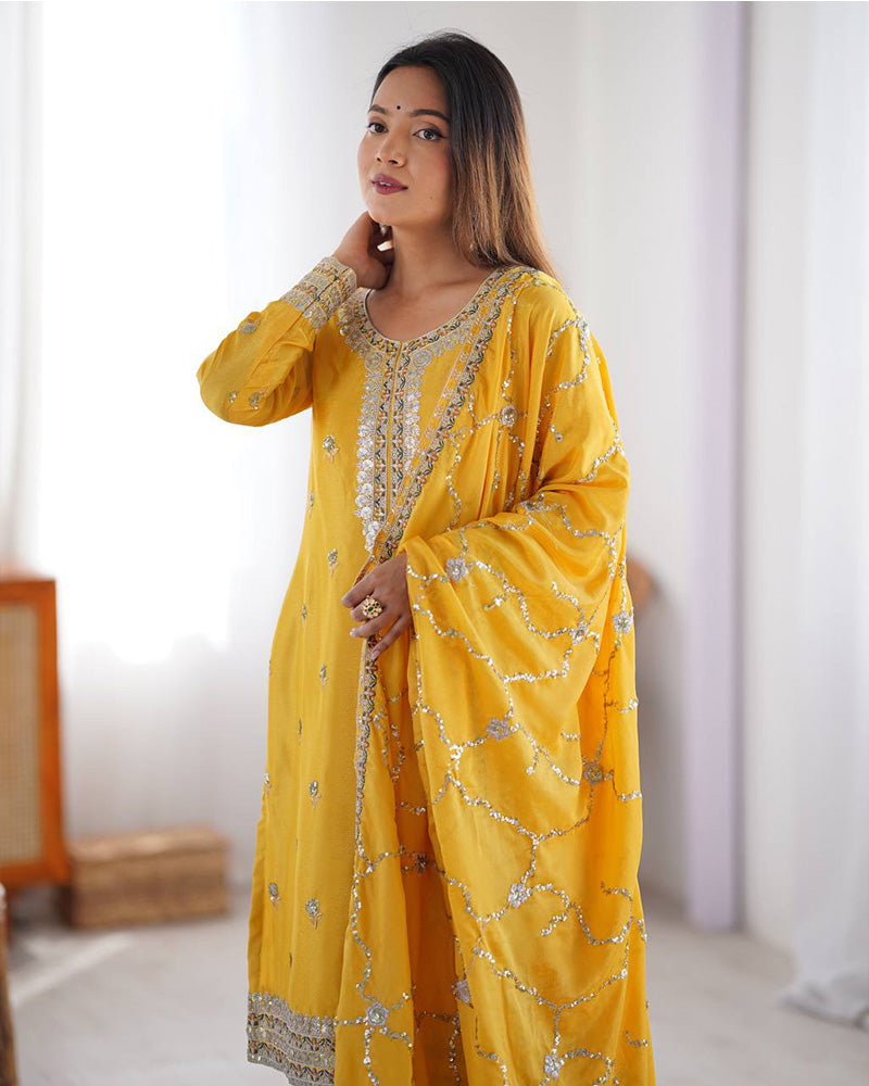 Raktima yellow Chinon silk kurti set featuring thread and sequin embroidery, paired with matching Chinon silk pants and an embroidered dupatta – perfect for weddings, festivals, and modern ethnic wear for women