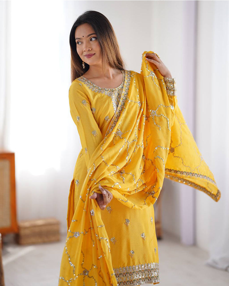 Raktima yellow Chinon silk kurti set featuring thread and sequin embroidery, paired with matching Chinon silk pants and an embroidered dupatta – perfect for weddings, festivals, and modern ethnic wear for women