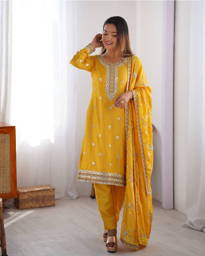 Raktima yellow Chinon silk kurti set featuring thread and sequin embroidery, paired with matching Chinon silk pants and an embroidered dupatta – perfect for weddings, festivals, and modern ethnic wear for women