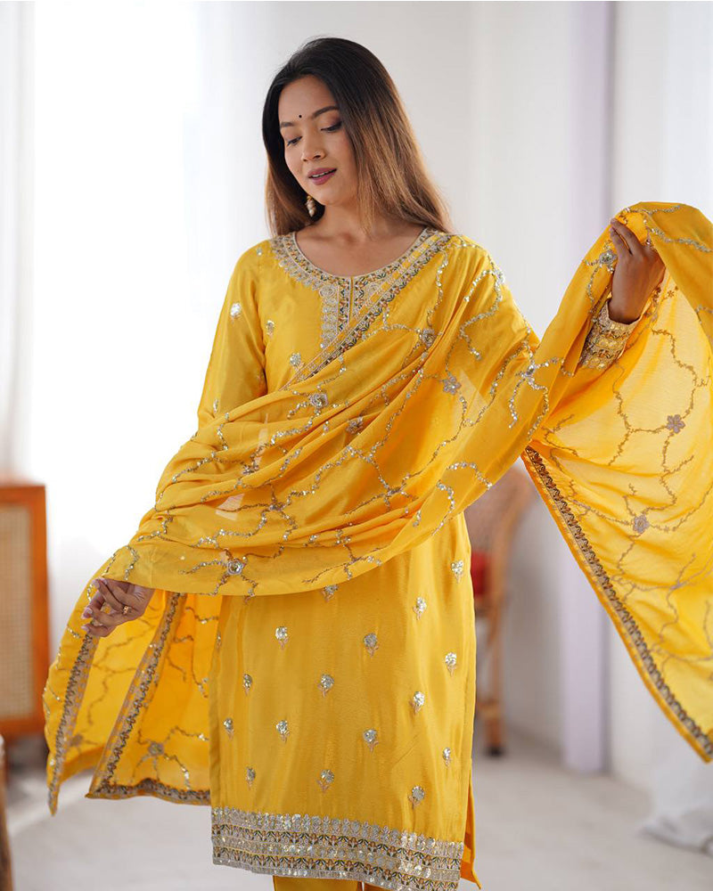Raktima yellow Chinon silk kurti set featuring thread and sequin embroidery, paired with matching Chinon silk pants and an embroidered dupatta – perfect for weddings, festivals, and modern ethnic wear for women