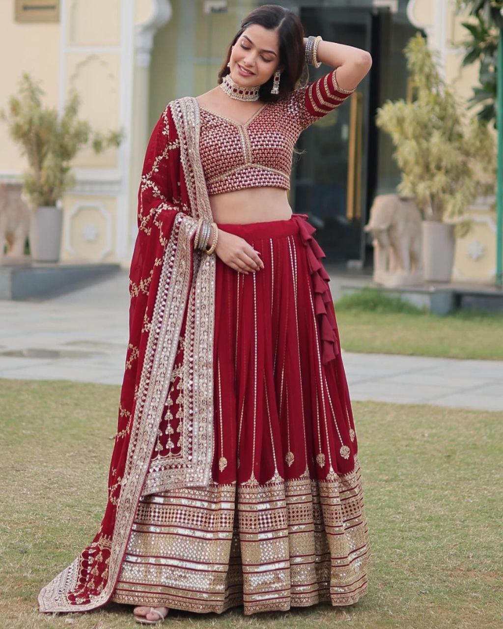 Sarvamangala red faux georgette zari lehenga set